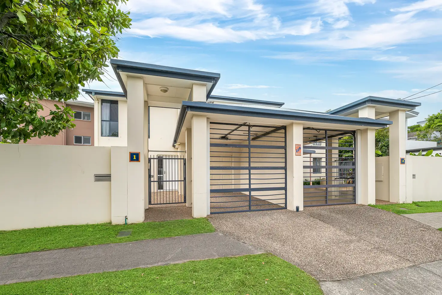 Main view of Homely townhouse listing, 1/129 Sunshine Parade, Miami QLD 4220