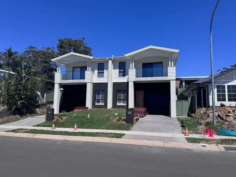 Main view of Homely semi-detached listing, 25 & 25A Gemini Way, Narrawallee NSW 2539