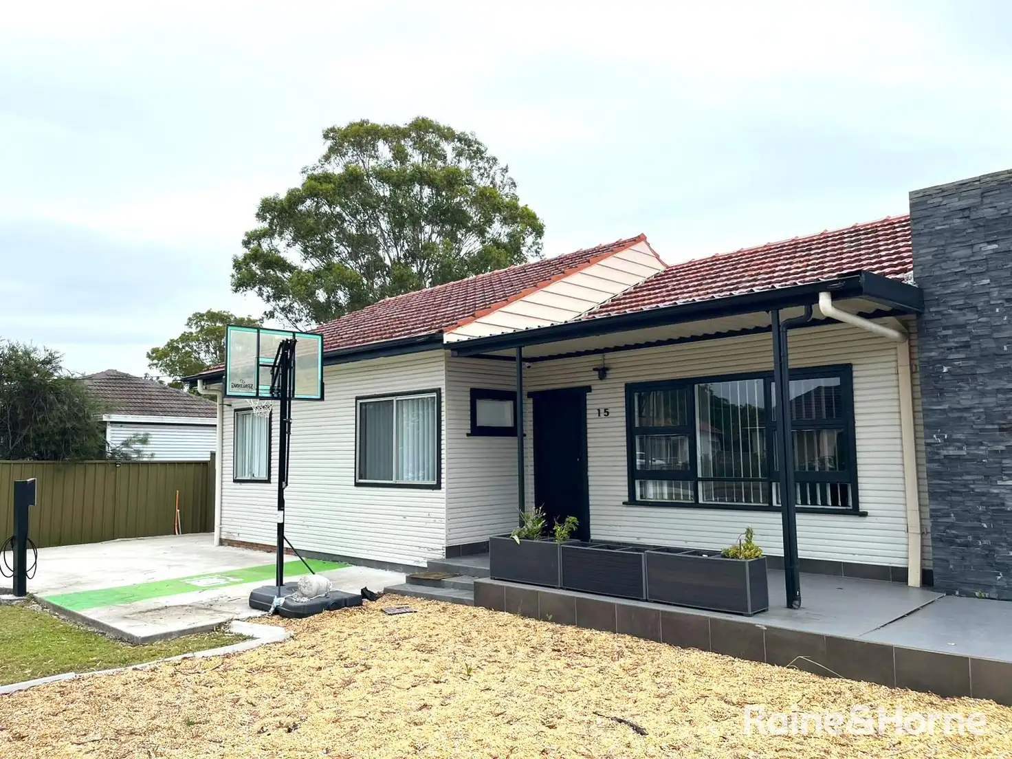 Main view of Homely house listing, 15 Waratah Crescent, Macquarie Fields NSW 2564