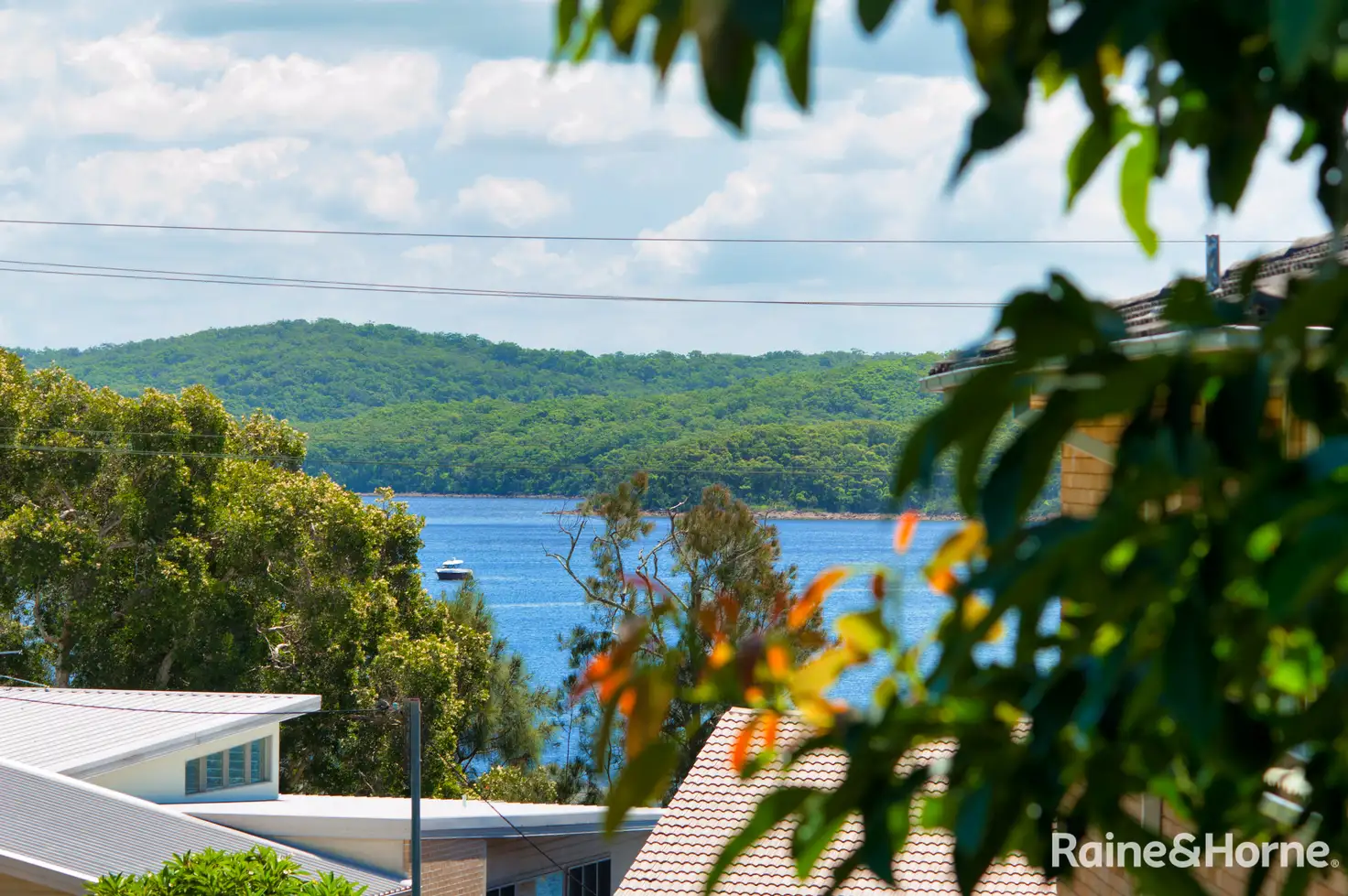Main view of Homely semi-detached listing, 2/9 Redman Place, Soldiers Point NSW 2317