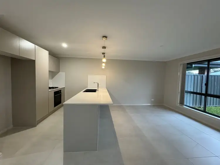 Third view of Homely semi-detached listing, 2/7 Quintero Close, Heddon Greta NSW 2321