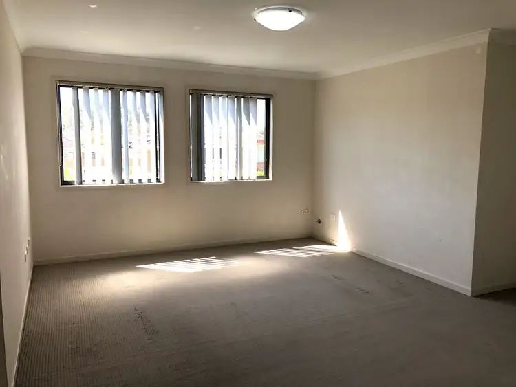 Second view of Homely townhouse listing, 1/84 Woodlands Drive, Glenmore Park NSW 2745