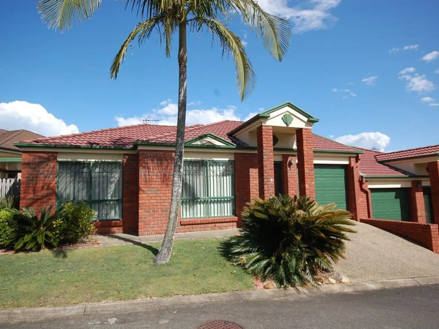 Main view of Homely villa listing, 21/442 Pine Ridge Road, Coombabah QLD 4216