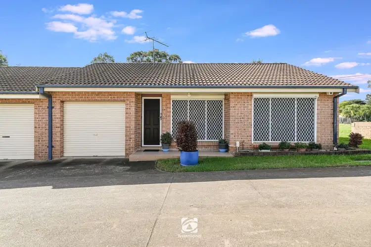 Main view of Homely villa listing, 11/2 Bensley Road, Macquarie Fields NSW 2564