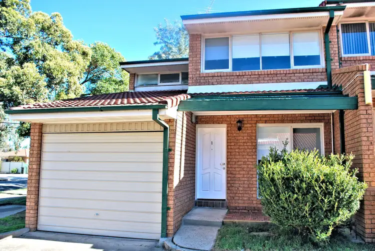 Main view of Homely townhouse listing, 1/9-11 Thelma Street, Lurnea NSW 2170