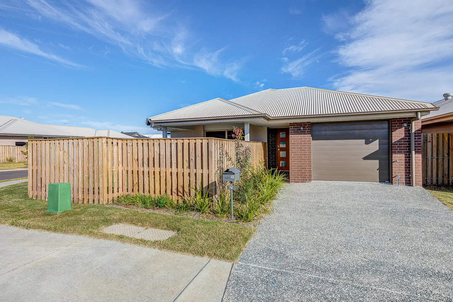 Main view of Homely semi-detached listing, 1/7 Barnyard Drive, Park Ridge QLD 4125