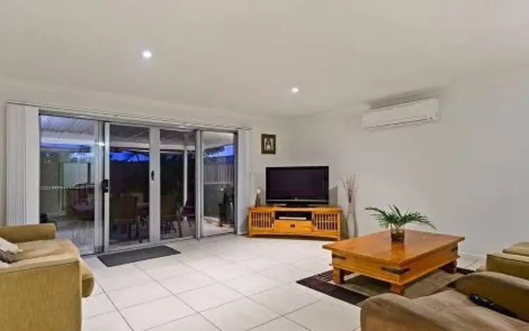 Second view of Homely semi-detached listing, 1/64 McAuley Parade, Pacific Pines QLD 4211